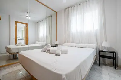 Cama o camas de una habitación en Hauzify I Apartament Estrella