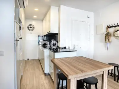 Una cocina o zona de cocina en Embajador 2 Apartament a primera línia de mar per 5 persones