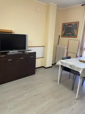 Una televisión o centro de entretenimiento en Apartamento Zodiac AB 1G