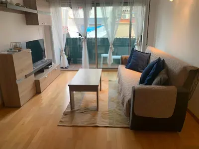 Una televisión o centro de entretenimiento en APARTAMENTO construcción nueva BARCELONA - CALELLA