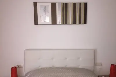Cama o camas de una habitación en APARTAMENTO construcción nueva BARCELONA - CALELLA