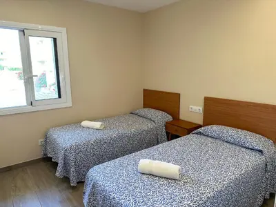 Cama o camas de una habitación en Paraiso 2 dormitorios en primera linea de mar - 333
