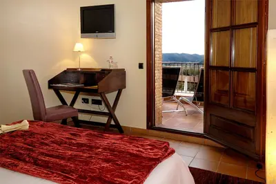 Una televisión o centro de entretenimiento en Spacious Villa in Sant Gregori with Private Pool