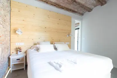 Cama o camas de una habitación en Bruma Boutique Apartment