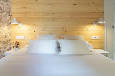 Cama o camas de una habitación en Bruma Boutique Apartment