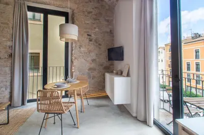Una televisión o centro de entretenimiento en Caelus Boutique Studio