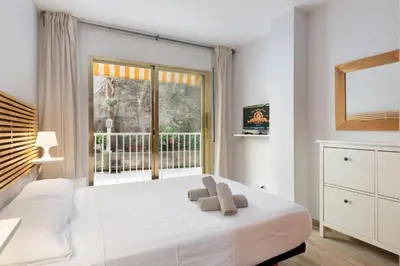 Cama o camas de una habitación en LETS HOLIDAYS Pool apartment near beach 5