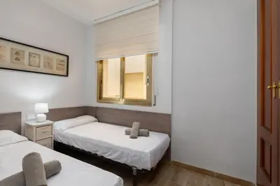 Cama o camas de una habitación en LETS HOLIDAYS Pool apartment near beach 5