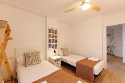 Cama o camas de una habitación en Bravissimo Pont de la Princesa, comfortable 3-bedroom apartment