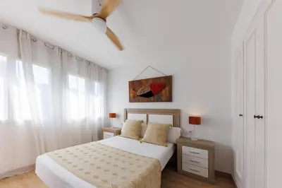 Cama o camas de una habitación en Bravissimo Pont de la Princesa, comfortable 3-bedroom apartment