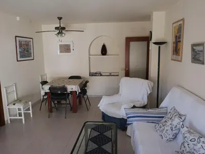 Zona de estar de LLOGUER30 Apartamento Lotus, piscina y parquing