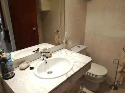 Un baño de LLOGUER30 Apartamento Lotus, piscina y parquing