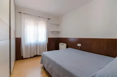 Cama o camas de una habitación en Club Villamar - Merlot