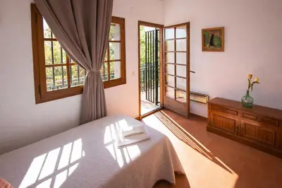 Cama o camas de una habitación en Catalunya Casas: Spacious Villa Vera up to 24 guests, a short drive to Blanes!