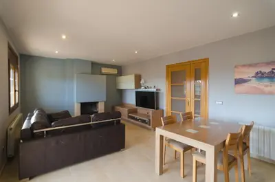 Una televisión o centro de entretenimiento en Club Villamar - Can Olbia