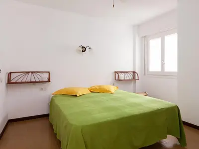 Cama o camas de una habitación en LETS HOLIDAYS Apartment sea views on the beach 3