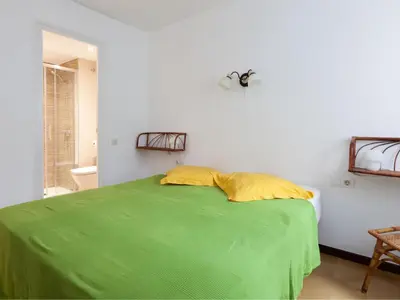 Cama o camas de una habitación en LETS HOLIDAYS Apartment sea views on the beach 3