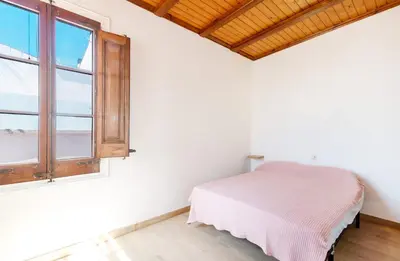 Cama o camas de una habitación en Precioso apartamento en primera línea de mar en Calella de Palafrugell