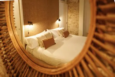 Cama o camas de una habitación en La Comuna by Bon Dia Residences