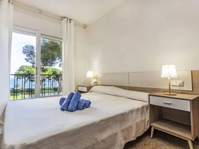 Cama o camas de una habitación en Apartment Palmeras by Interhome