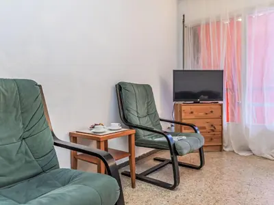 Una televisión o centro de entretenimiento en Apartment Palmeras by Interhome