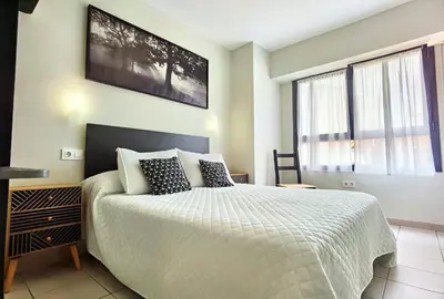Cama o camas de una habitación en HOSTAL RIGAU