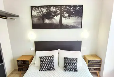 Cama o camas de una habitación en HOSTAL RIGAU