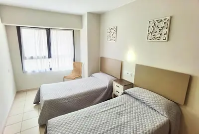 Cama o camas de una habitación en HOSTAL RIGAU