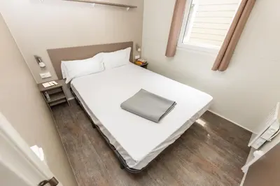 Cama o camas de una habitación en Camping Bellsol Pets