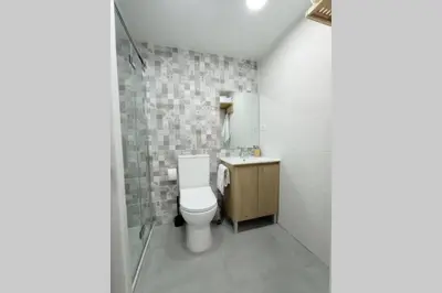 Un baño de Apartamento con piscina a 2 minutos de la playa!!!