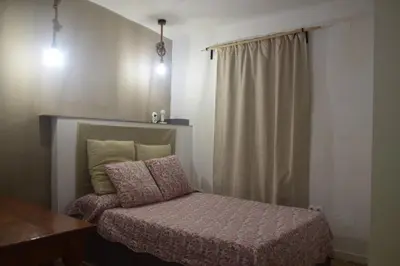 Cama o camas de una habitación en Habitación delante de la playa Blanes