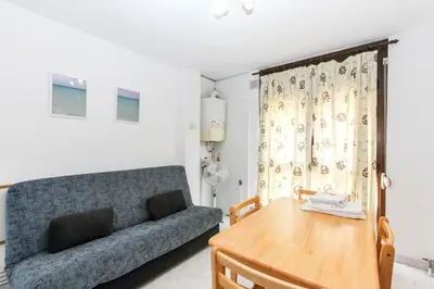 Zona de estar de Apartment Bond