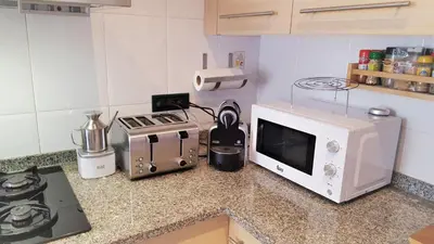 Una cocina o zona de cocina en Apartamento Mediterraneo