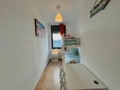 Cama o camas de una habitación en Precioso apartamento 4 habitaciones con piscina y gym