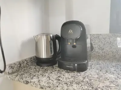 Utensilios para hacer té y café en Precioso apartamento 4 habitaciones con piscina y gym