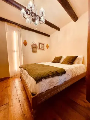 Cama o camas de una habitación en Auténtica casa del SXVII en la Costa Brava