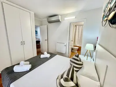 Cama o camas de una habitación en LA MER BLEUE, Boutique Apartament with free parking, full equipped in Fenals Beach