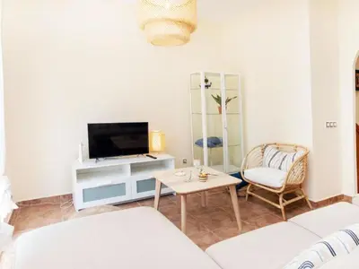 Una televisión o centro de entretenimiento en Apartamento 