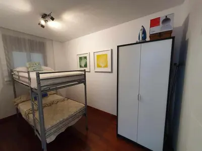 Cama o camas de una habitación en Lujoso apartamento a 1a línea del mar