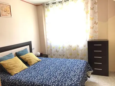 Cama o camas de una habitación en Bonito apartamento a 250m del mar