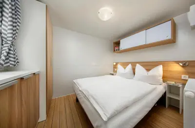Cama o camas de una habitación en Albatross Mobile Homes on Camping El Pla de Mar