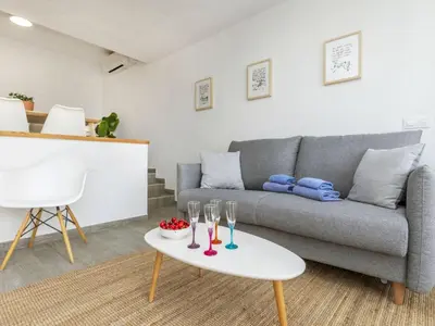Zona de estar de Apartment Garbi Salions by Interhome