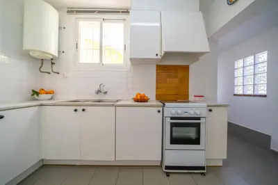 Una cocina o zona de cocina en Villa Vista Piscina Vistas Mar Barbacoa Aire Acondicionado