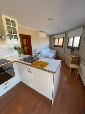 Una cocina o zona de cocina en El Jardí de la Muralla