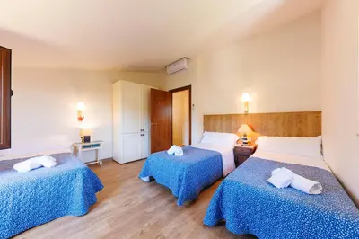 Cama o camas de una habitación en Turisme Rural - Mas Vilà - Monells