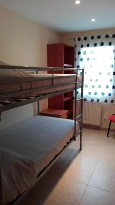 Cama o camas de una habitación en Holiday Paraiso