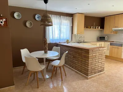 Una cocina o zona de cocina en Holiday Paraiso