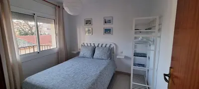Cama o camas de una habitación en Sa Shei Apartment Tossa de Mar