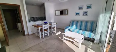 Una televisión o centro de entretenimiento en Sa Shei Apartment Tossa de Mar