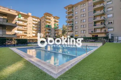 Piscina en o cerca de Rancho suizo Apartament per 4 persones amb vistes al mar amb piscina comunitària